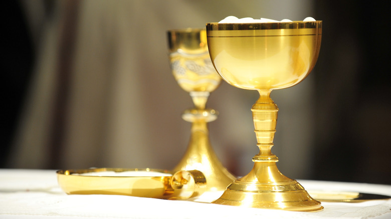golden chalices on an altar