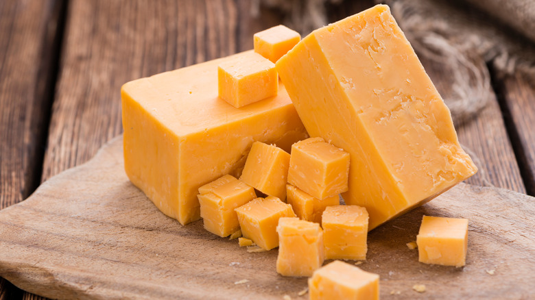 A block of cheddar cheese