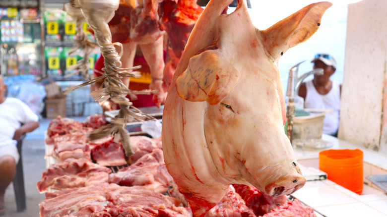 A pig head at a meat market