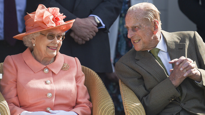 Queen Elizabeth and Prince Philip smiling