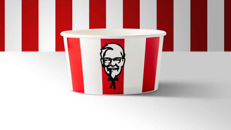 KFC bucket on red and white background