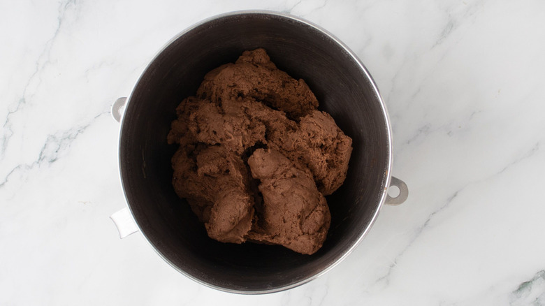 Brown bread dough in mixing bowl