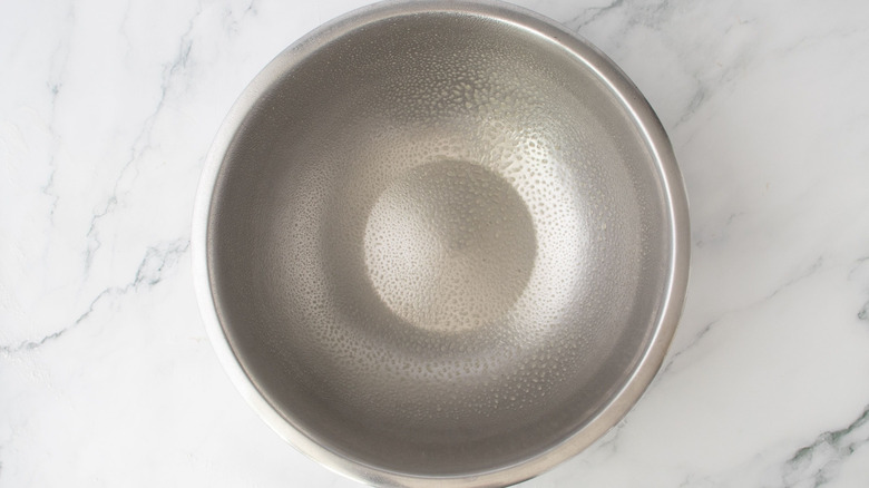 Greased mixing bowl
