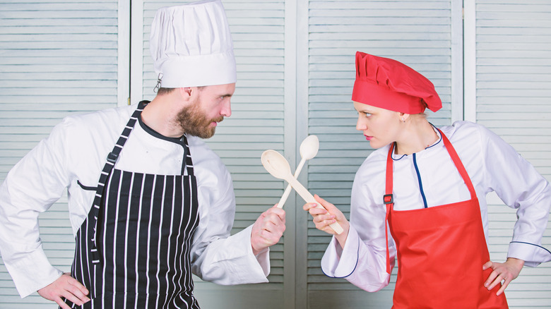 chefs exchanging fierce stares