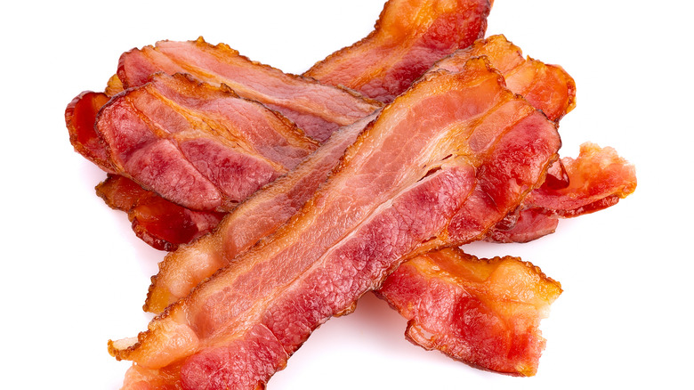 bacon strips on white background