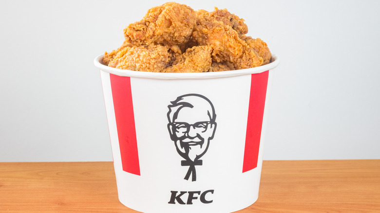 Bucket of KFC fried chicken on table