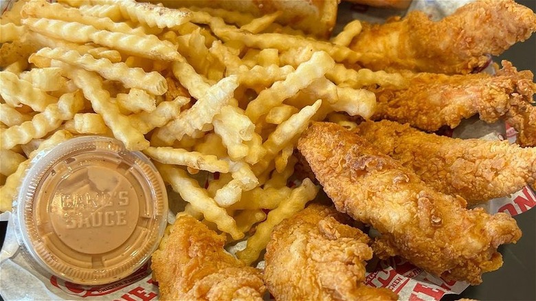 a basket of Raising Cane's chicken and fries