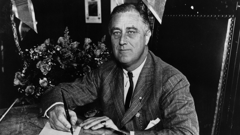 Franklin D. Roosevelt writing letter