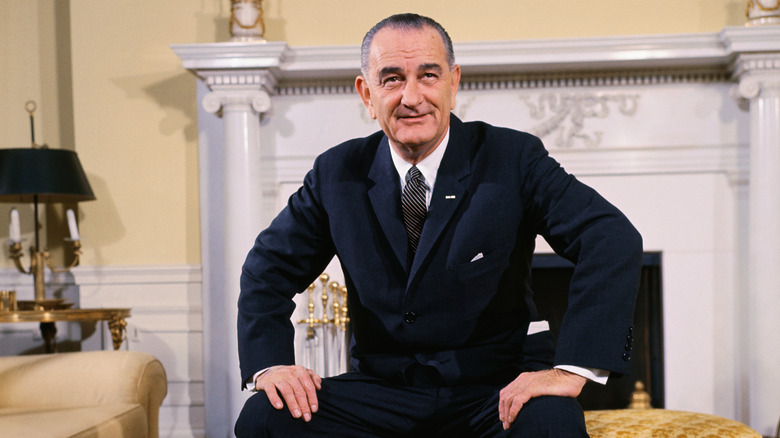 Lyndon B. Johnson sitting in chair