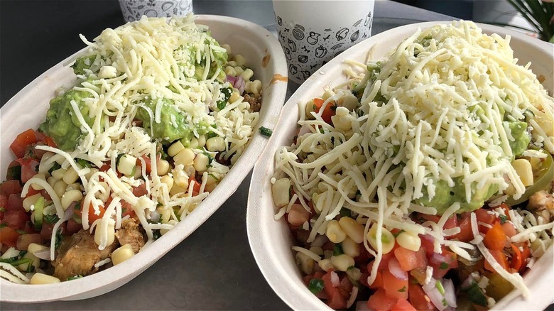 two burrito bowls from chipotle