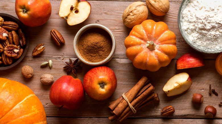 Spices and fruits on table