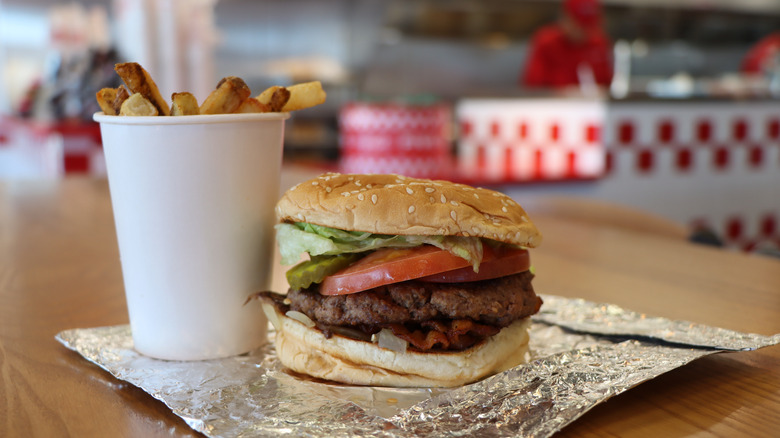 Five Guys burger and cup of fries