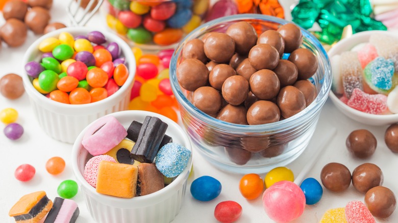 Chocolates and candies in small bowls