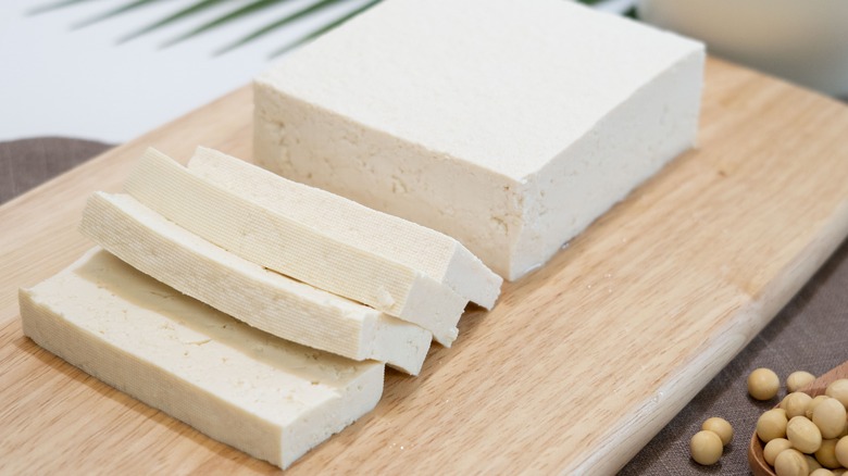 slices of tofu on a wooden board