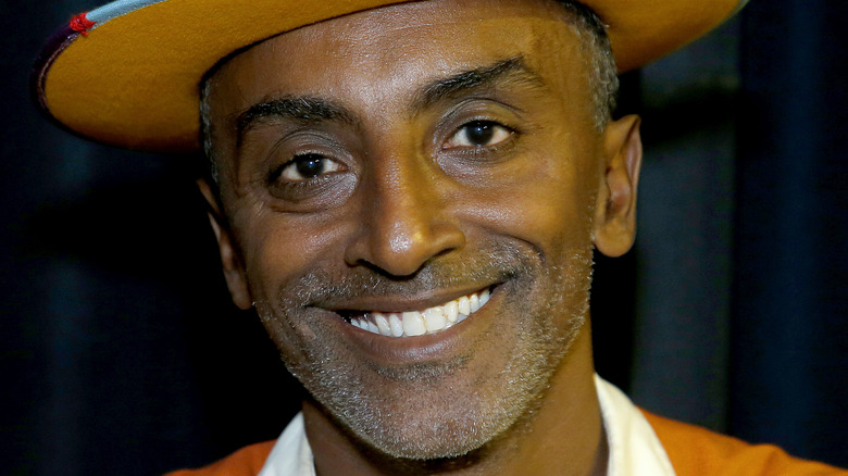 Marcus Samuelsson close-up in a hat