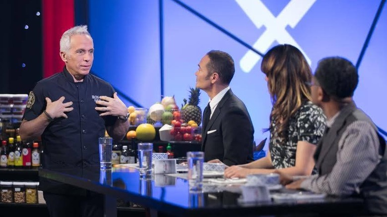 Contestant on set of Iron Chef America in front of judges