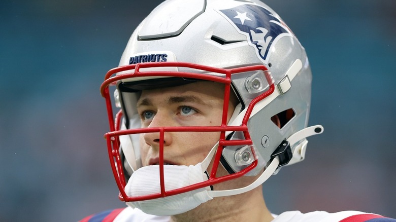Mac Jones in Patriots helmet