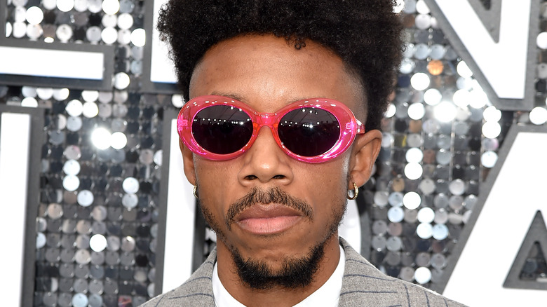 Darrell Britt-Gibson wearing pink sunglasses