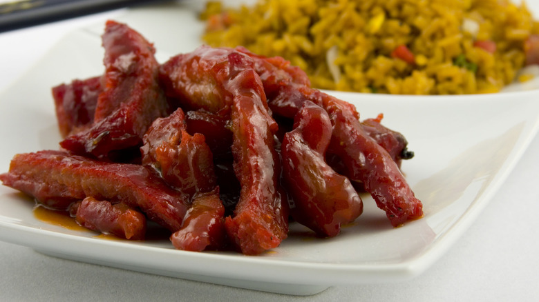 boneless pork ribs on a plate with rice