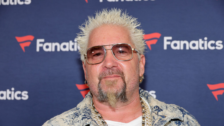 Guy Fieri wearing aviator glasses