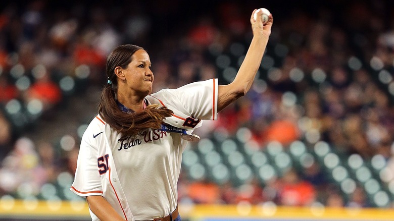 Cat Osterman holding a softball