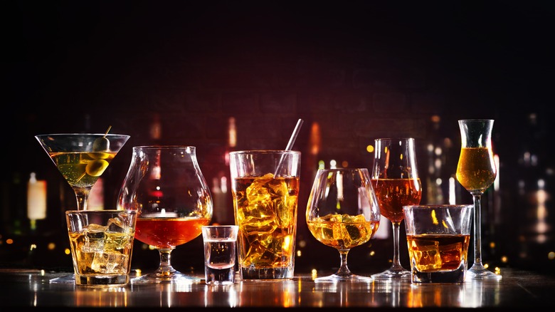 various alcoholic drinks on a bar