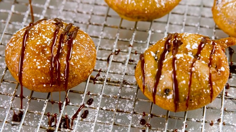 Fried Oreos drizzled with chocolate