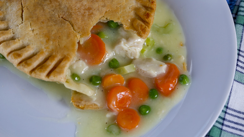 Pot pie with filling coming out