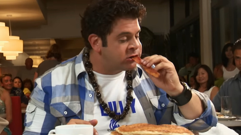 Adam Richman with pancakes and bacon