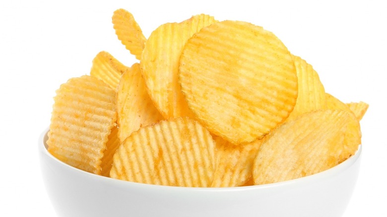 bowl of potato chips with ridges