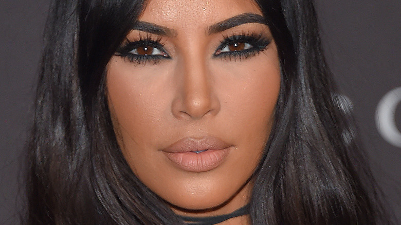 Kim Kardashian with hair down and full makeup