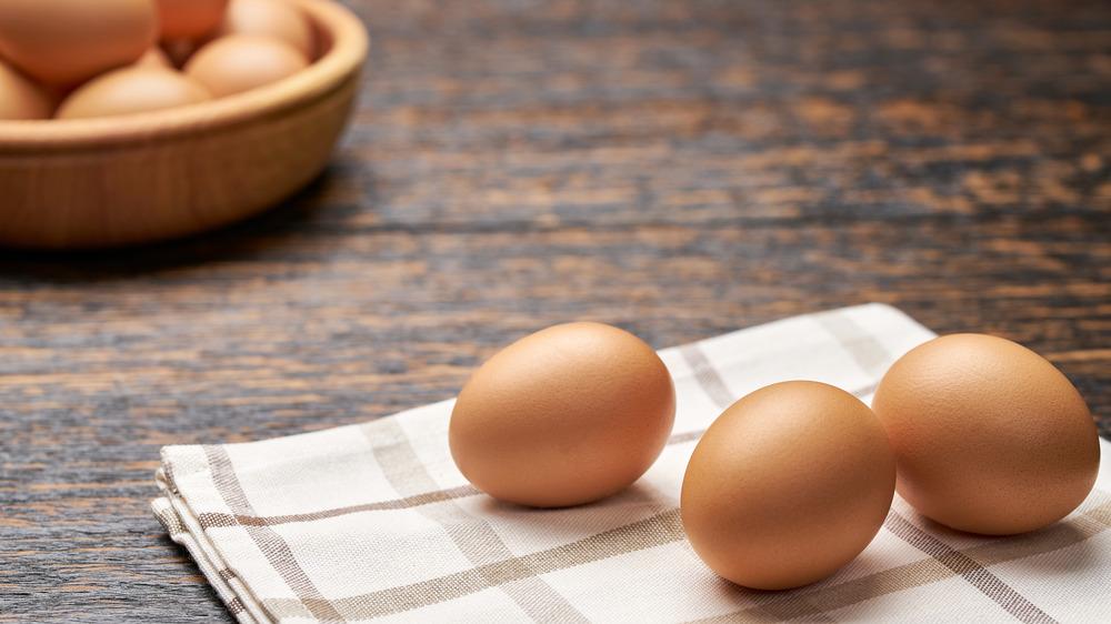 Eggs on a wooden table