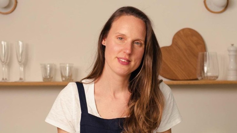 Frances Quinn with hair down and slight smile