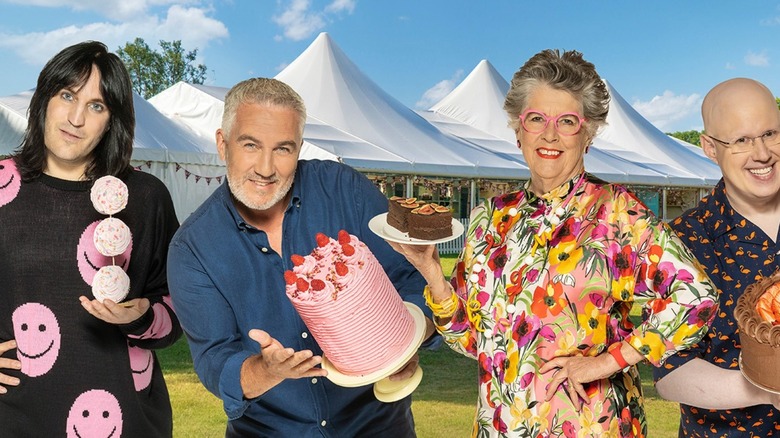 Noel Fielding, Paul Hollywood, Prue Leith, and Matt Lucas smiling