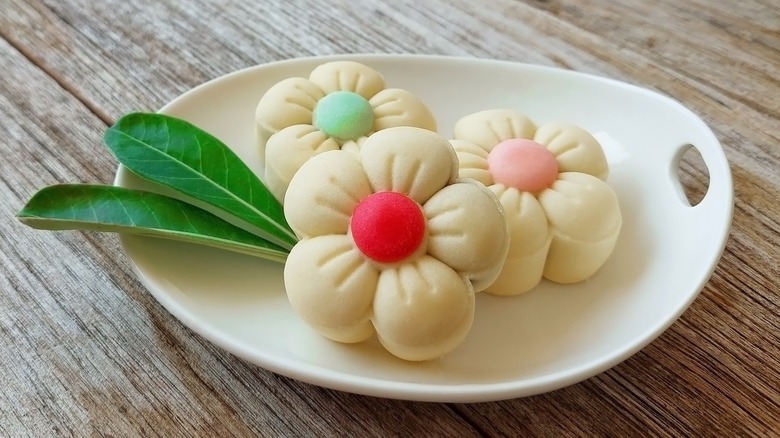 Flower-shaped shortbread cookies on plate
