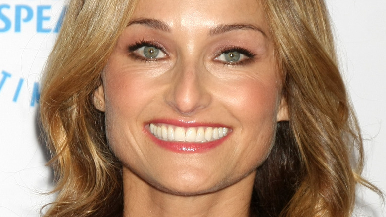 Giada De Laurentiis with hair down and wide smile