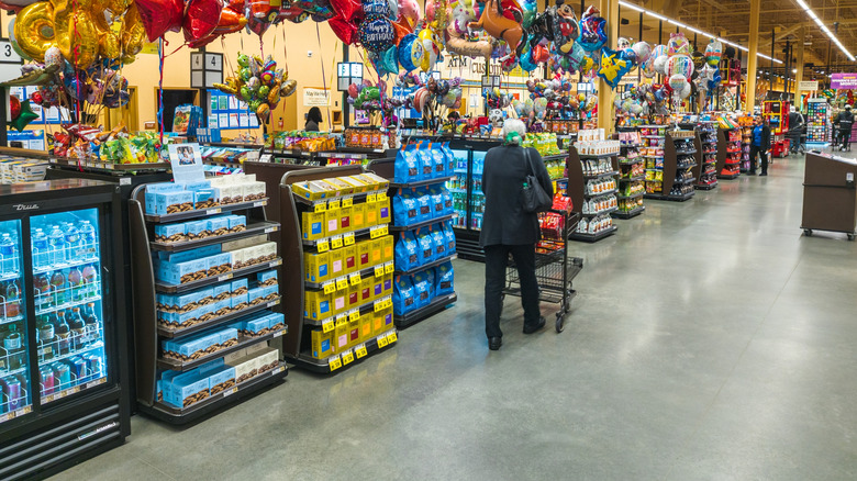 Checkout lanes inside grocery store.