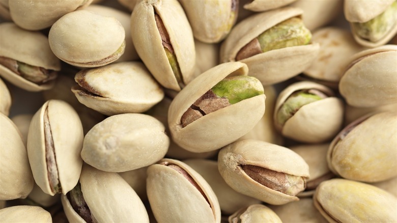 unshelled pistachios sitting in pile