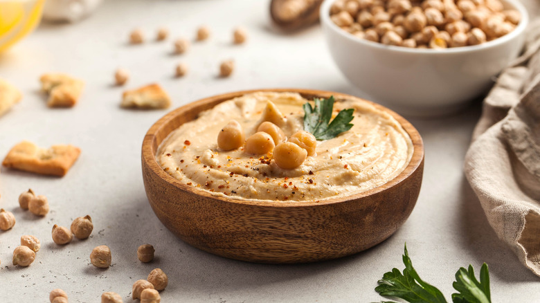 hummus in a wooden bowl