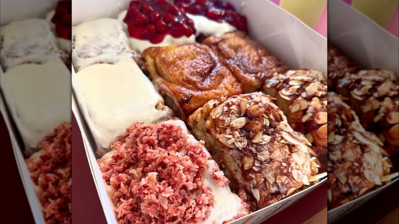 Box of Old West cinnamon rolls with different toppings