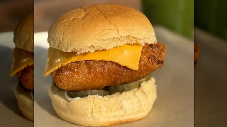 Close-up of a fried fish sandwich with cheese
