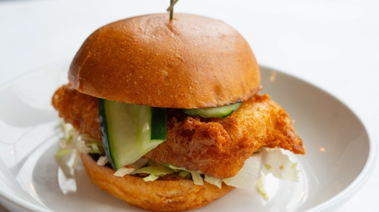 Fish sandwich with cucumbers