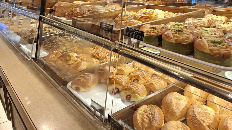 Variety of baked goods and bread in a case