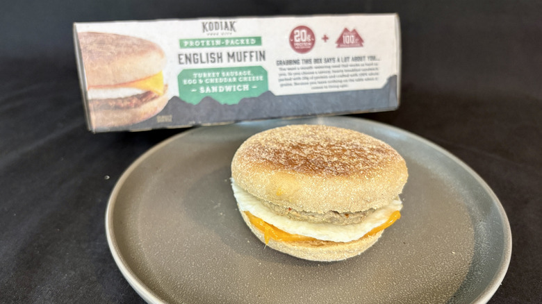 Kodiak breakfast sandwich on plate in front of box