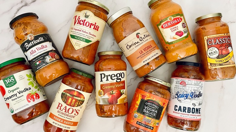 Nine jars of store-bought vodka sauce