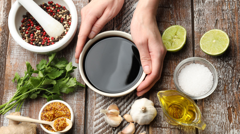 Bowls of ingredients and seasonings to make a sauce