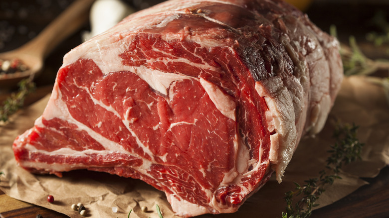 Raw prime rib on butcher paper