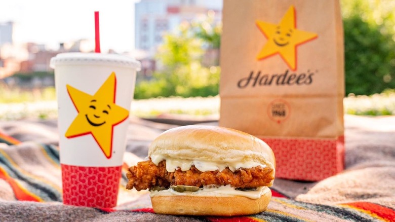 Hardees meal on picnic blanket