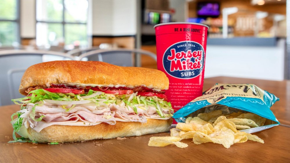 Jersey Mike's sandwich with chips and soda