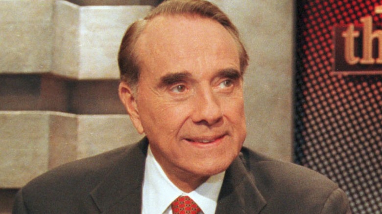 Bob Dole smiling in suit